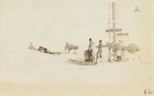 Image of Putting in water on Bowdoin in winter quarters